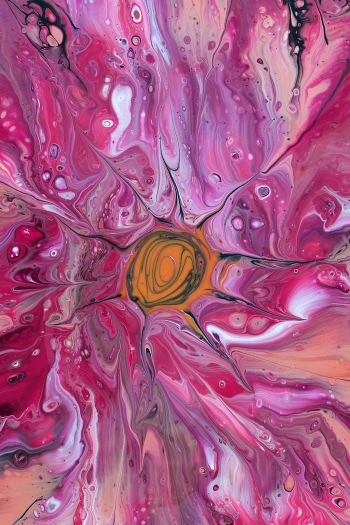 Vibrant abstract fluid art with swirling pink and orange patterns.